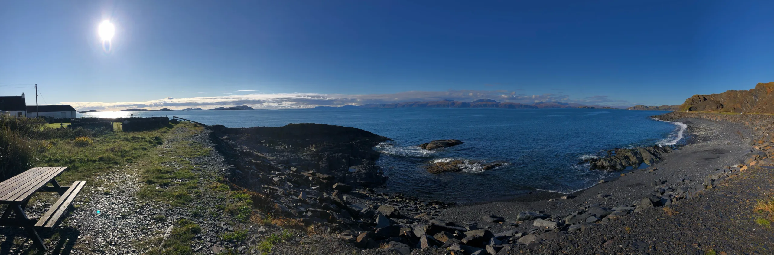 Panoramic view of the shoreline on the famous Scottish slate island Luing.